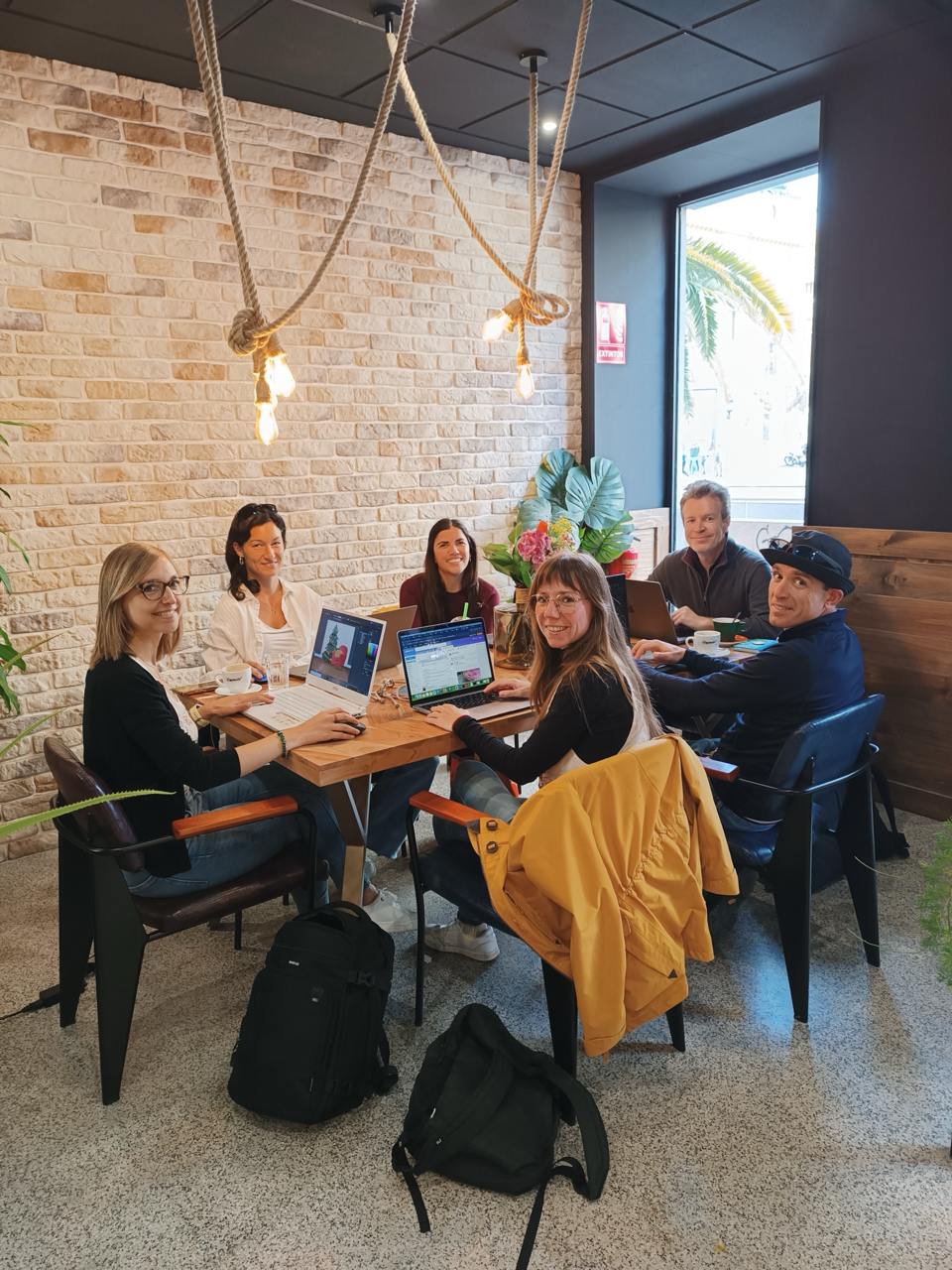 Digital nomads working together in a coworking space in Alicante